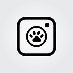 Hipster photo or retro camera with pet paw icon simple design. Instant camera abstract social media line icon.