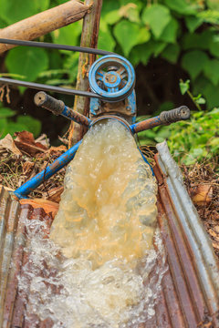 Water flowing through a large tube The engine pump into the field