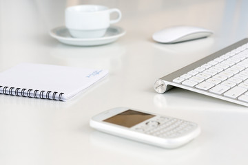 Business Composition on white Desk with coffee