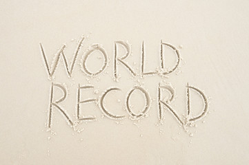 Message for World Record written in smooth sand on the beach in Rio de Janeiro, Brazil