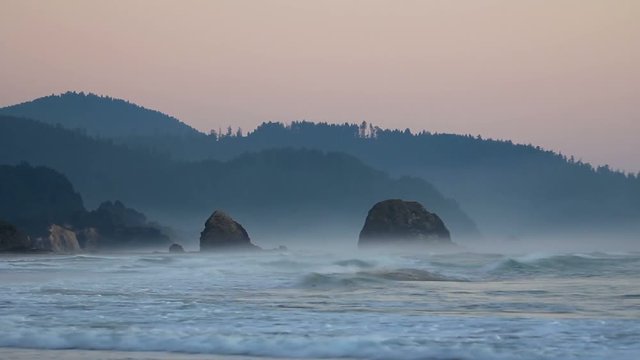 High definition movie of crashing waves audio in Cannon Beach Oregon with Haystack Rock along Pacific Ocean 1080p
