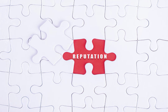 Missing white puzzle with REPUTATION  word and copyspace area.