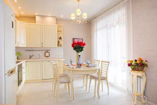 Interior bright kitchen-living room