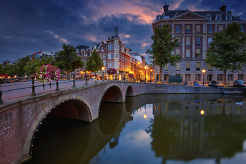 Amsterdam. Image of Amsterdam, Netherlands during dramatic sunrise.