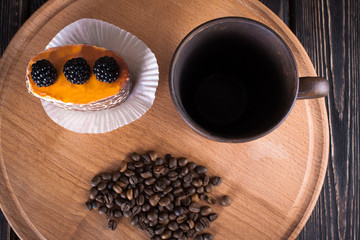 spoon ground coffee with coffee beans