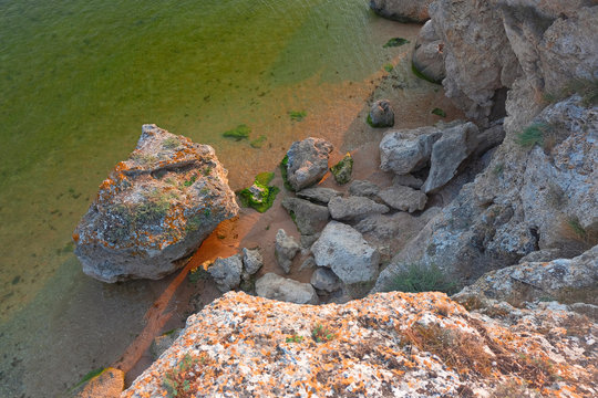 Sea and rugged cliffs above voew