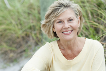 Older Caucasian woman smiling outdoors