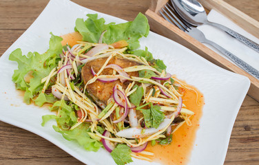 Fillet topped with a spicy dressing.