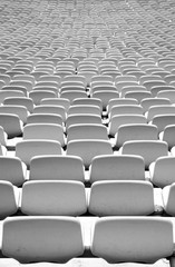 Naklejka premium Green Stadium seating in rows from behind