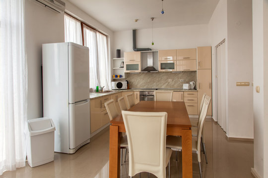 Modern kitchen interior with dinning room. Interior photography.