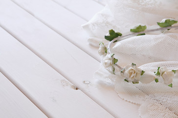 White floral tiara on toilette table. Selective focus