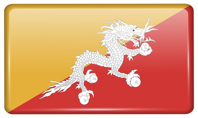 Flags Bhutan in the form of a magnet on refrigerator with reflections light. Vector