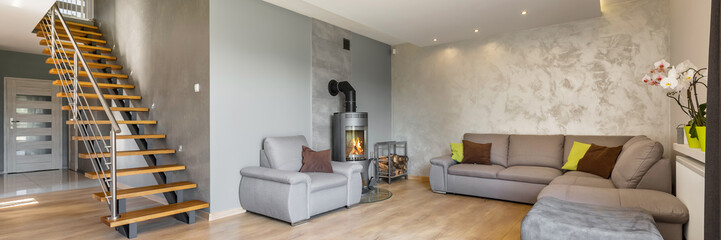 Spacious living room with stairs