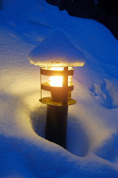 Lantern in snow