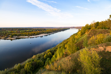 Fototapeta na wymiar Wide river from the height of the autumn