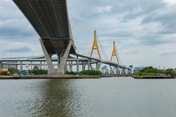 "Bhumiphol bridge" High way across Chaopraya river in Bangkok Thailand with cityscape background.