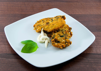 Salmon fish croquettes on plate