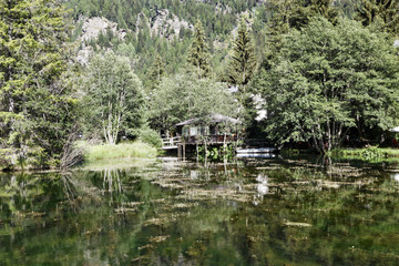 Placid alpine lake in Champoluc, Italy