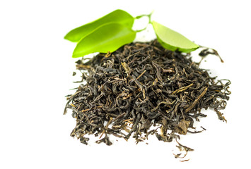 Tea with the green leaves on the white background - isolated