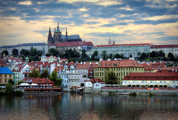 Fototapeta premium Prague Casle and the embankment of Vltava River by summer evening, Prague