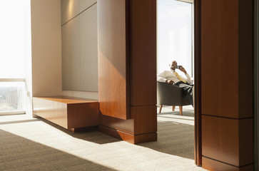 African American businessman talking on cell phone