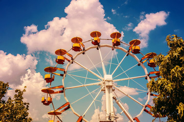 Ferris Wheel In Fun Park On Blue Sky
