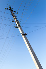 electric pole on the background of blue sky