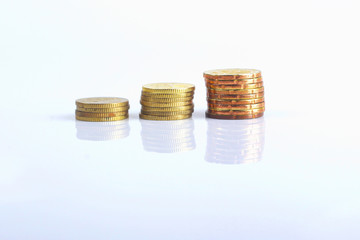 gold coin stack isolated on white.