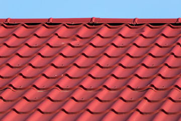 red roof tiles on the roof as a background