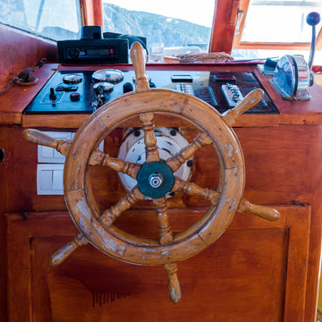 Ship's cabin with instruments and wheel