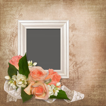 Frame with roses on an old vintage background