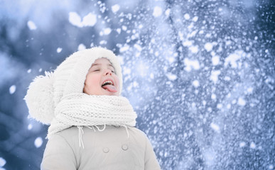 Obraz premium Cute girl outdoor in winter. Winter holiday concept.