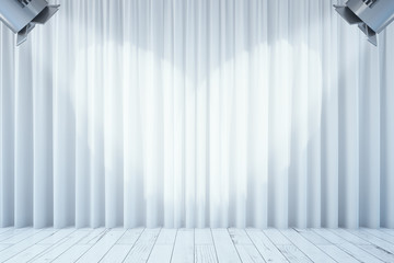 White curtains with two spotlights