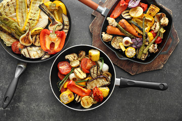 Grilled vegetables on pans, closeup