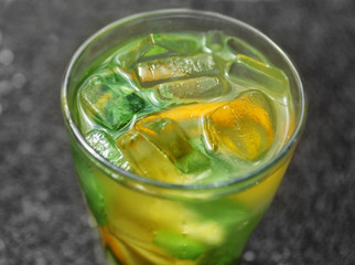 Glass of cool drink on table, closeup