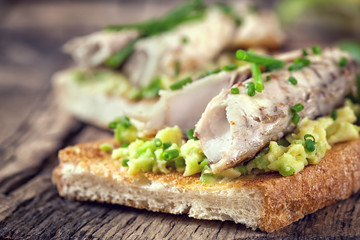 Sandwich with fish and avocado 