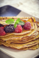 Pancake - Crepes with berries, mint and honey 