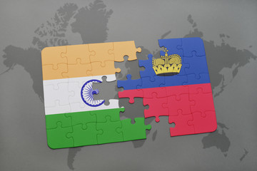 puzzle with the national flag of india and liechtenstein on a world map background.