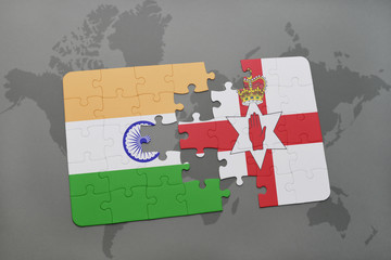 puzzle with the national flag of india and northern ireland on a world map background.