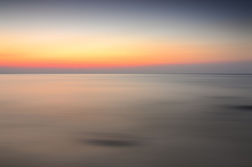 Fototapeta na wymiar Long Exposure of Soft and colorful sunset.