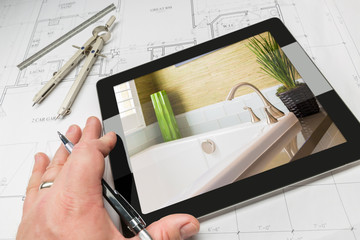 Hand of Architect on Computer Tablet Showing Luxury Bathroom Details Over House Plans, Compass and...