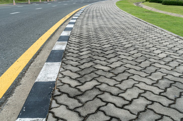 Asphalt road with yellow line