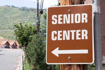 Sign for the Senior Center with arrow