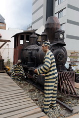 Fototapeta premium Sculpture of convicts in Ushuaia.Ushuaia is the southernmost city in the world.