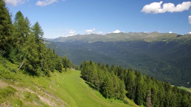 Dolomites, Italy - Aerial view on the pistes of Padola, small town among the Dolomiti Venete. This ski resort will be connected to Sexten - Drei Zinnen in 2017.
