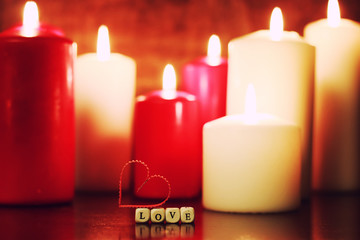 macro candle light with heart shape