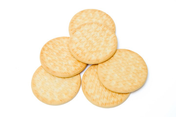 Tasty fast wheat cookies on a white background.