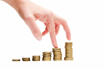 Hand step on Coins. White background Isolated. Bussines concept. 