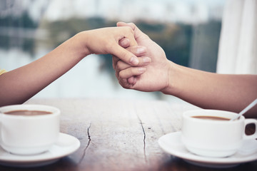 Hands of man making proposal to girlfriend