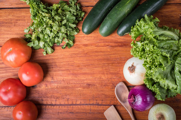 Vegetables over wooden table